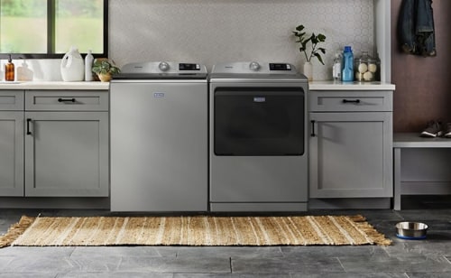 Maytag® top load laundry pair in gray cabinetry