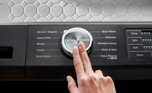 A closeup of Maytag® washing machine cycles and settings
