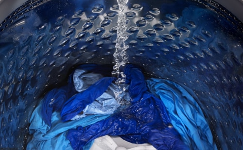 Water running on clothing in a washing machine