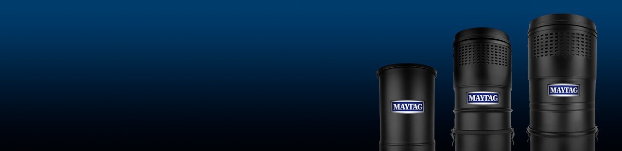 Three black Maytag® central vacuums in different sizes.