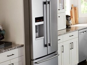 French door refrigerator in a bright, white kitchen
