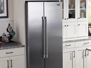 Stainless side-by-side refrigerator in a white kitchen