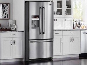 French door refrigerator in a bright, white kitchen