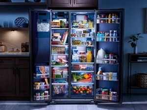 Open side-by-side refrigerator filled with food