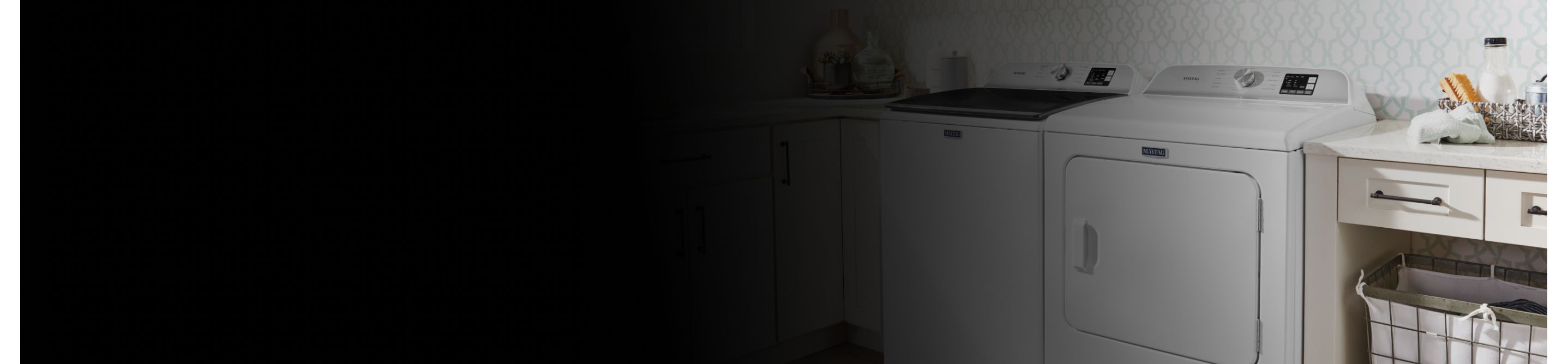 Laundry room with a white Maytag® washer and dryer