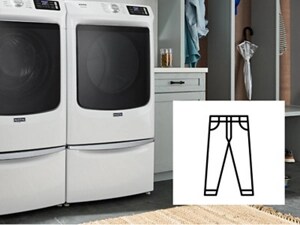 Maytag® side-by-side front load washer and dryer in a modern laundry room