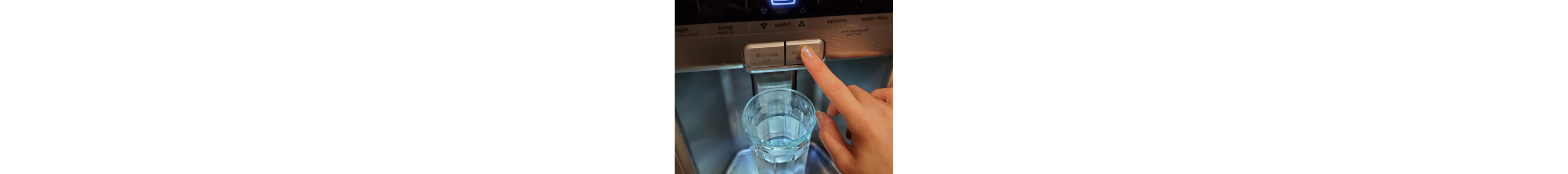  A finger pressing the water button