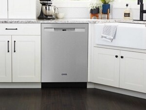 Maytag® dishwasher in white cabinetry