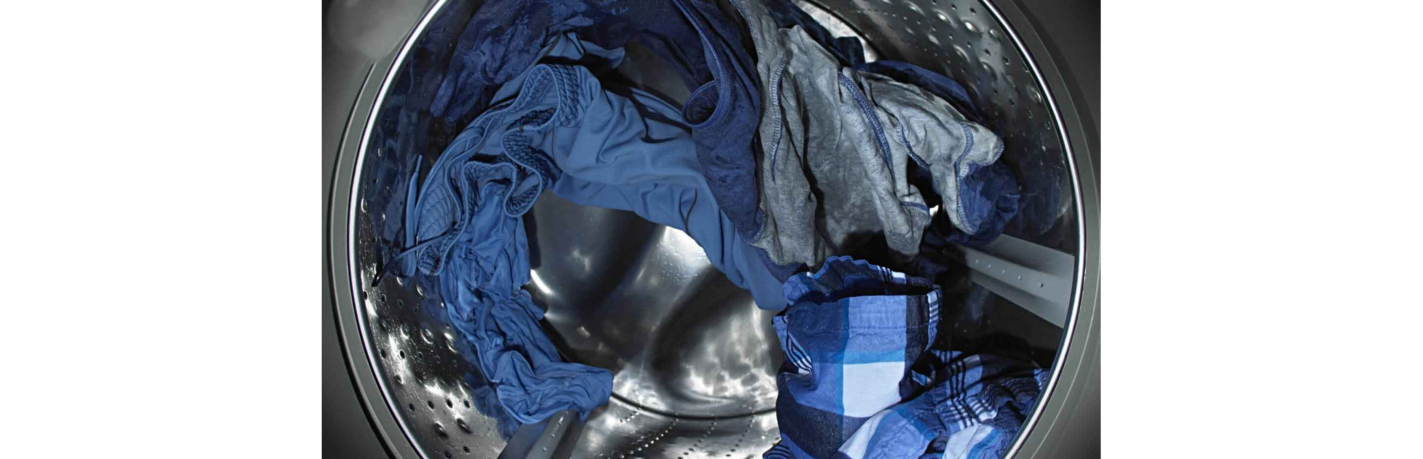 Wet clothes tumbling in washer