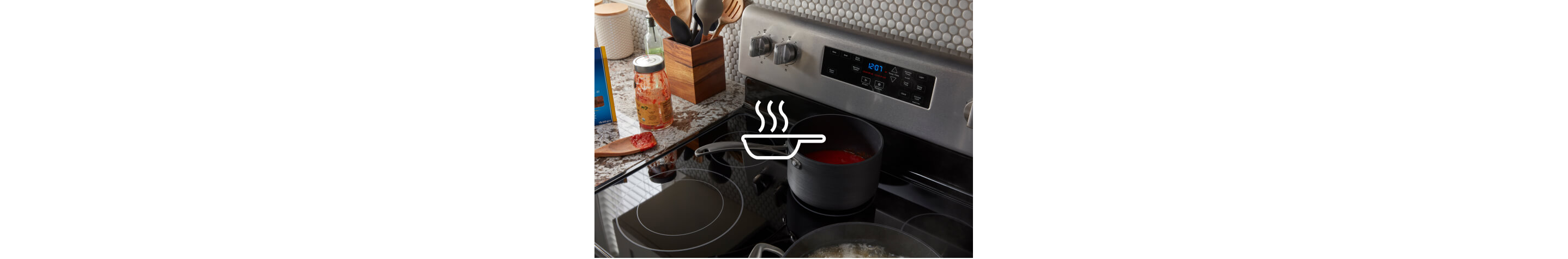 Sauce warming on the warming center of a Maytag® range.