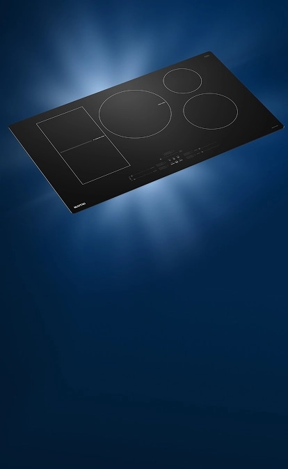 A Maytag® Induction Cooktop on a dark background.