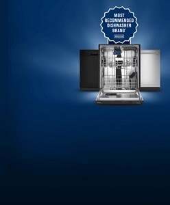 A stainless steel dishwasher against a dark background.