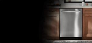 A stainless steel Maytag dishwasher in a kitchen