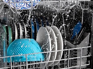 Dishes getting washed in a dishwasher