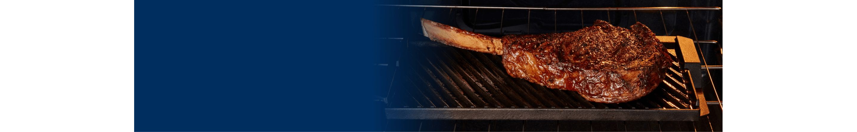 Tomahawk steak sizzling inside a Maytag® range