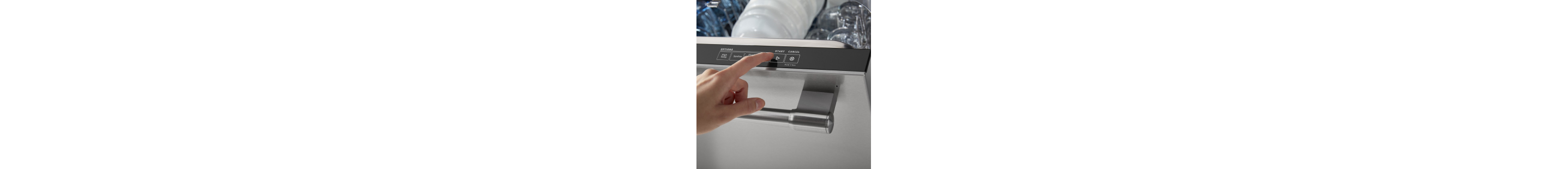 Person selecting a dishwasher cycle