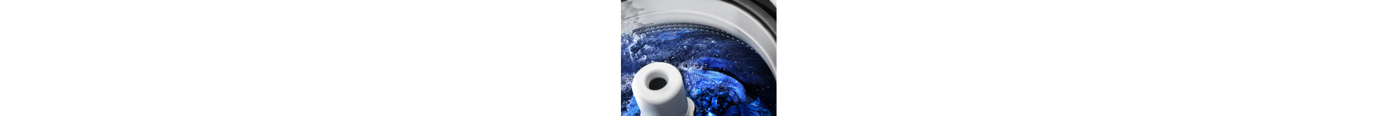Washing machine open to show agitator cleaning clothes