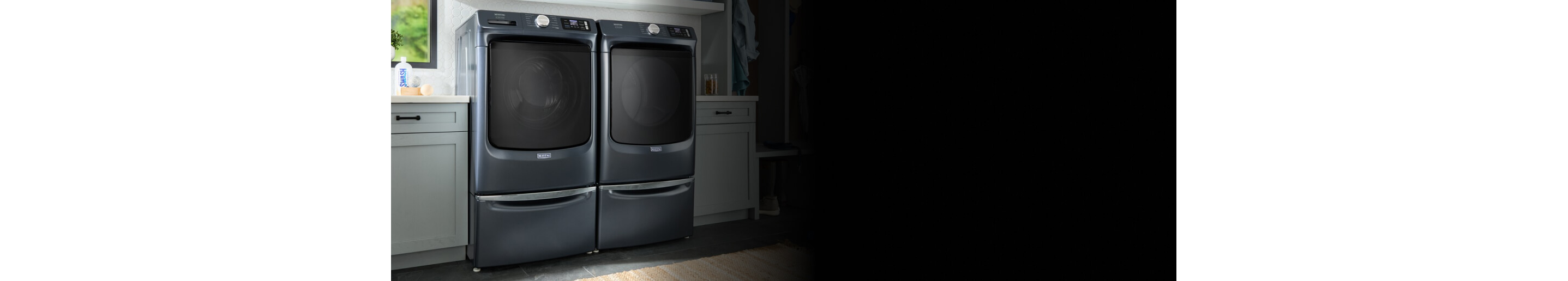 Maytag® front load washer and dryer set on laundry pedestals