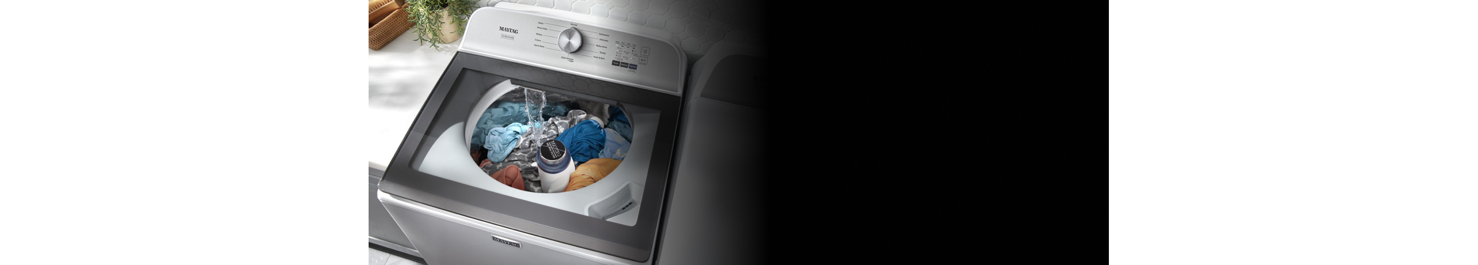 Maytag® top load washer filled with laundry