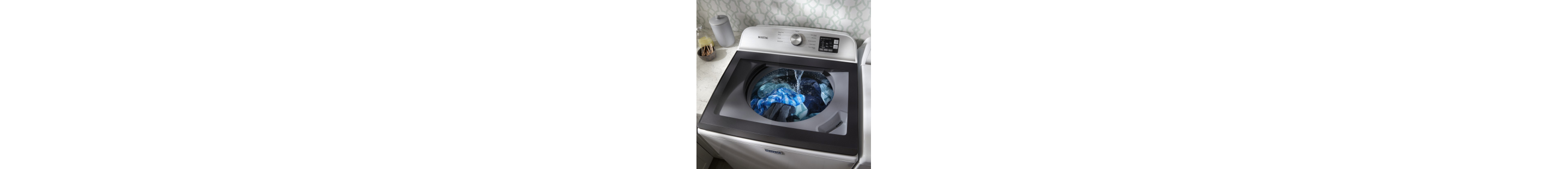 Top load washing machine running a wash cycle