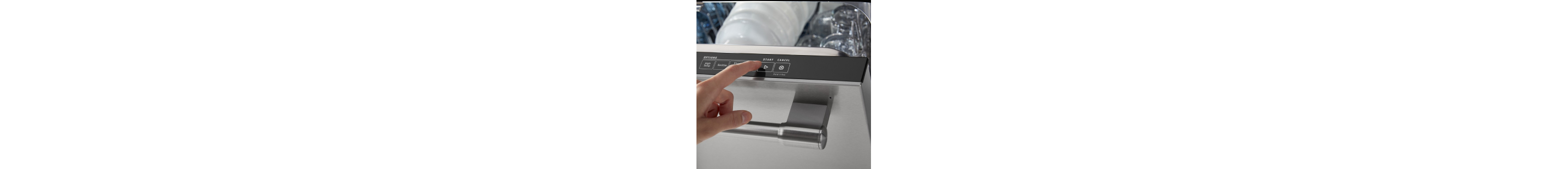Person selecting a setting on a dishwasher control panel