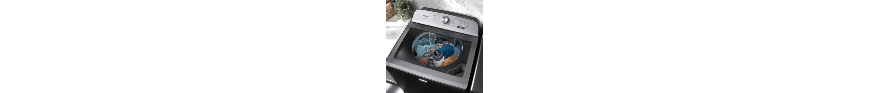 Maytag® top load washer filled with laundry