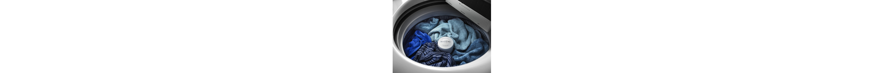 Laundry inside a top load washing machine