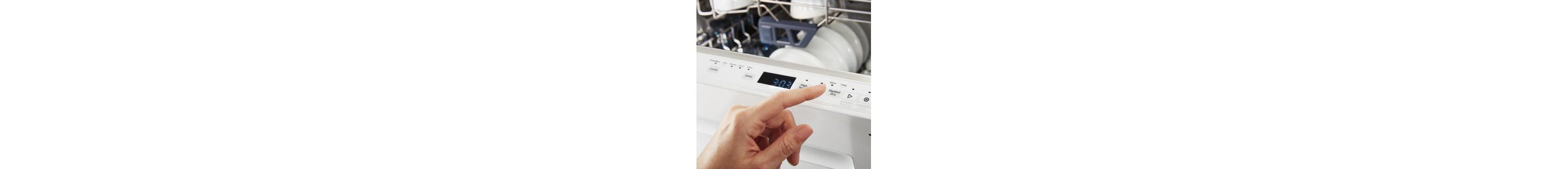 A person pressing buttons on a top panel dishwasher