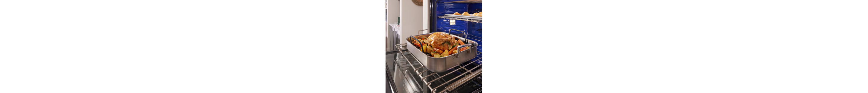 A chicken roasting in an oven