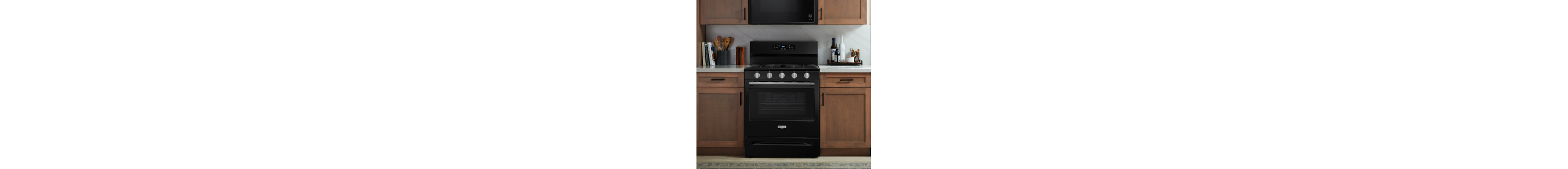 A Maytag® range and microwave in a kitchen