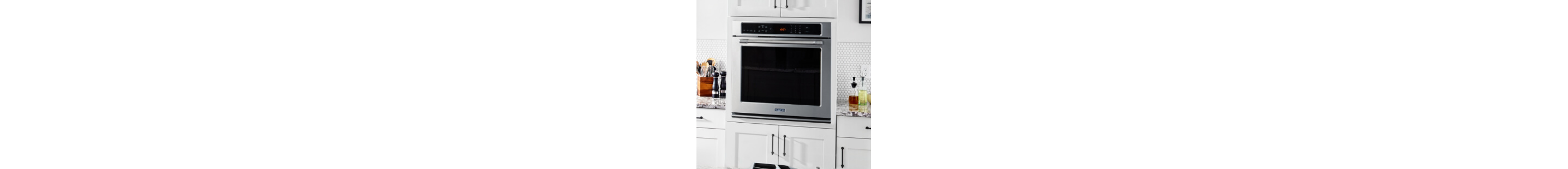 Wall oven in a white kitchen