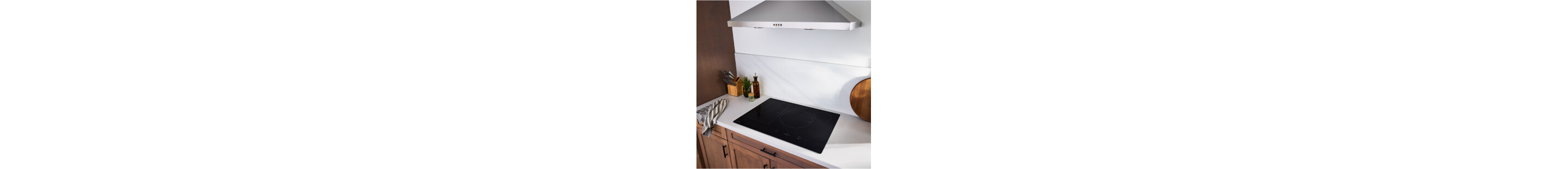 An induction cooktop on a white countertop
