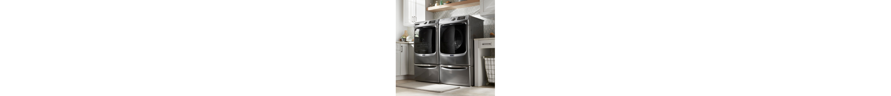 A Maytag® washer and dryer in a laundry room