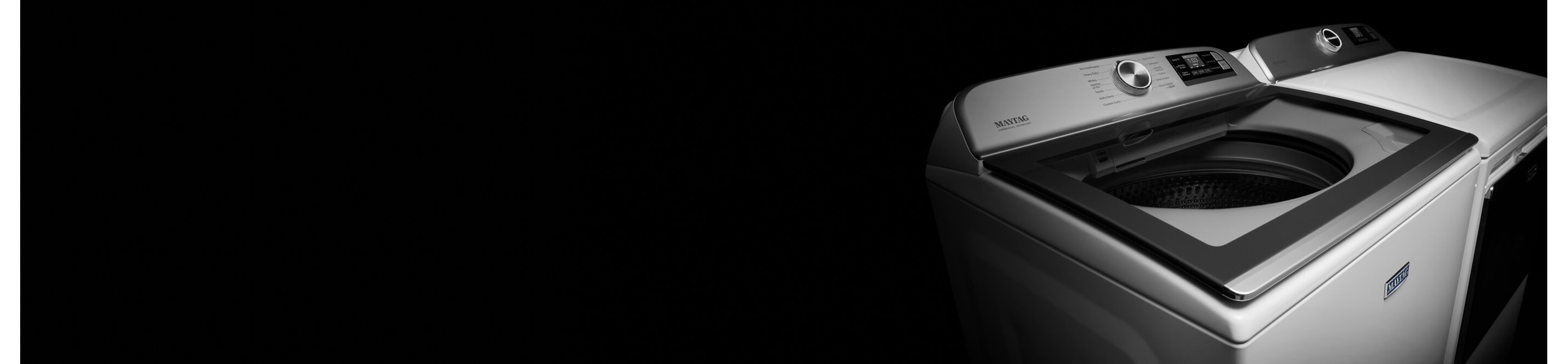 A white Maytag® top load washer and dryer