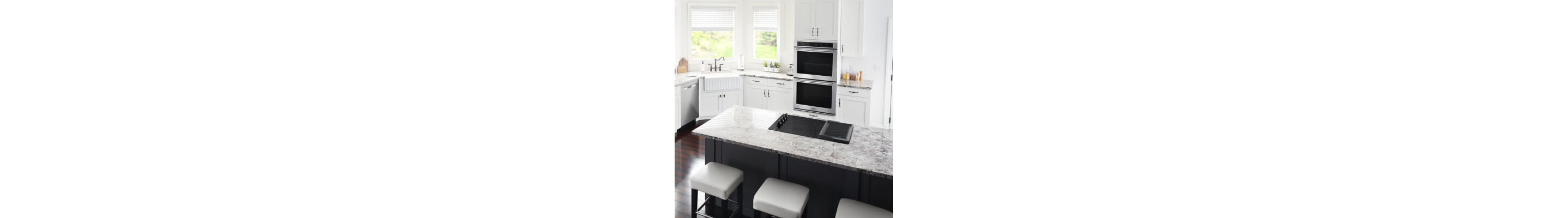 A Maytag® electric cooktop in a modern kitchen