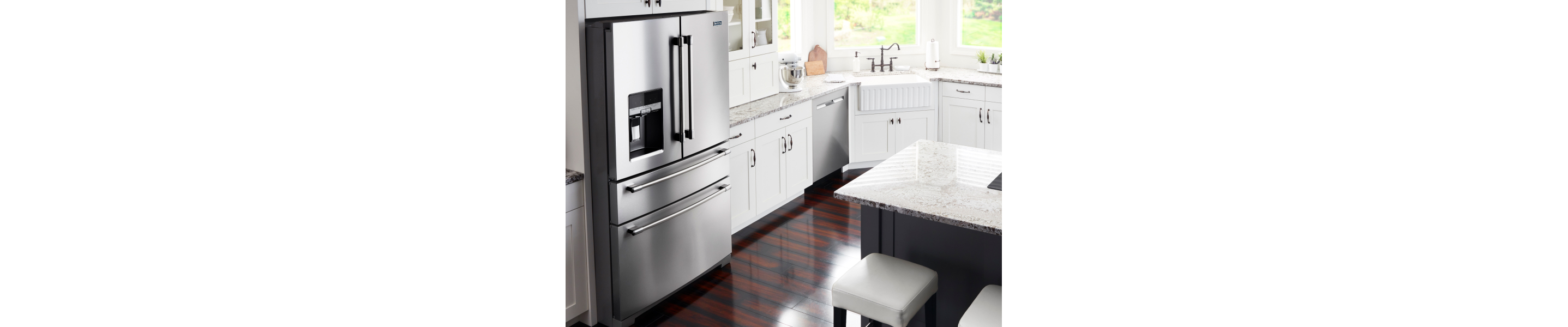  Kitchen view with a Maytag brand refrigerator with a soft freeze drawer