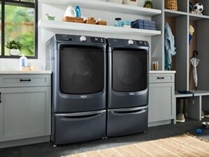 A Maytag® washer and dryer pair in a laundry room
