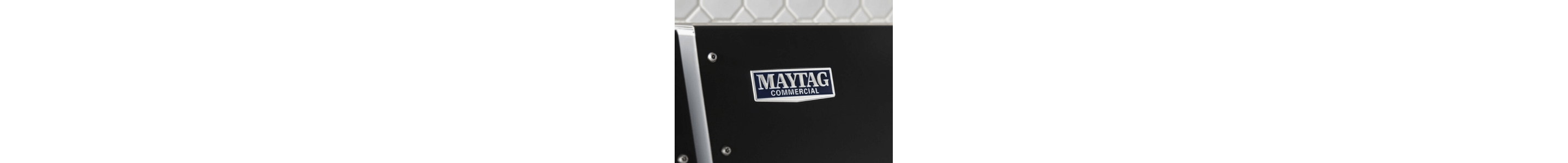 Maytag logo on a washing machine