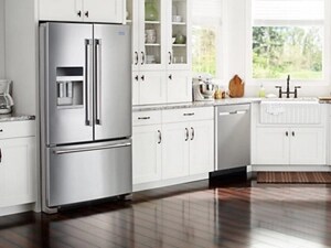 Stainless steel Maytag® French door refrigerator in white cabinetry