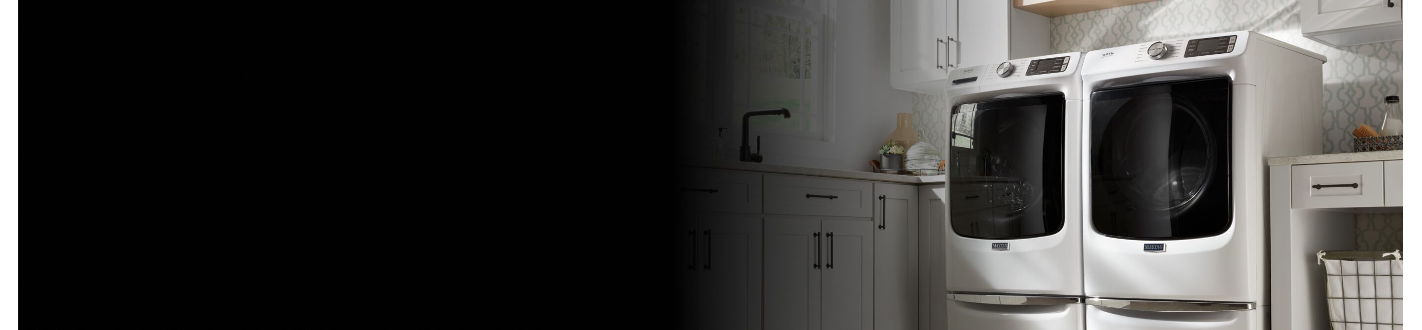A white, front-load Maytag® washer and dryer set