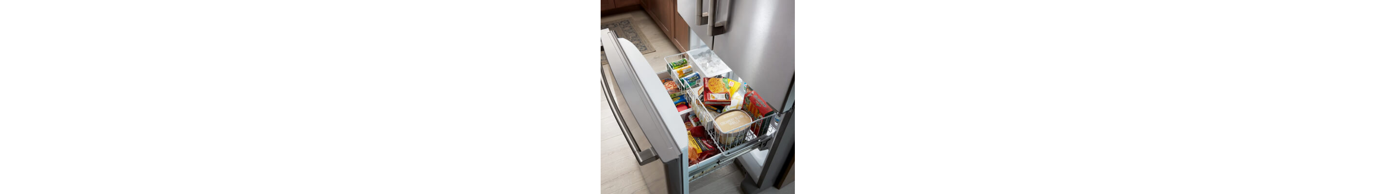 Open freezer compartment in a Maytag bottom-freezer refrigerator