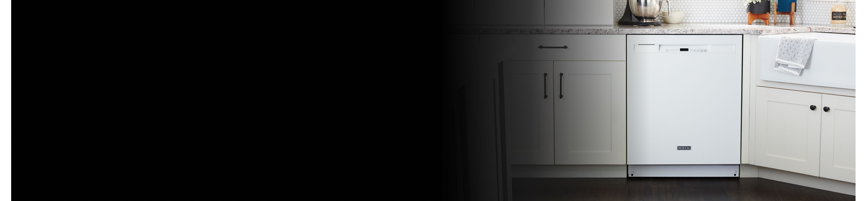 White front control dishwasher in a kitchen
