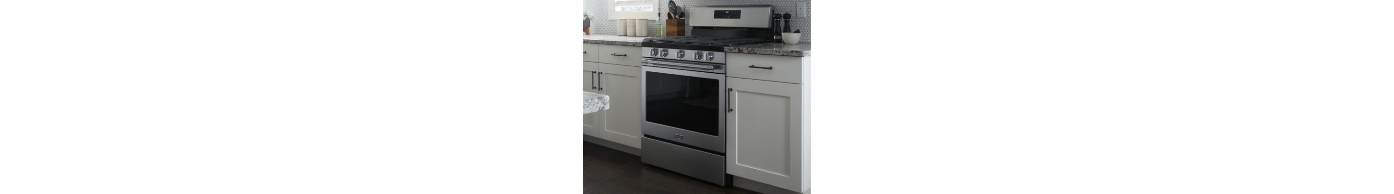 Maytag®  range in a white kitchen 
