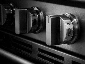 A close-up of the knobs on a Maytag® oven