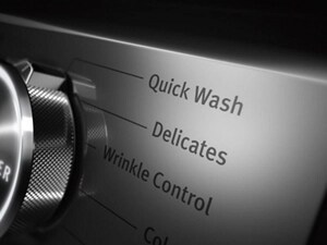 A close-up of a Maytag® washer console