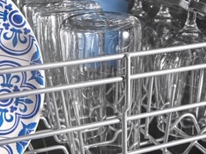 Clean dishes on a dishwasher rack