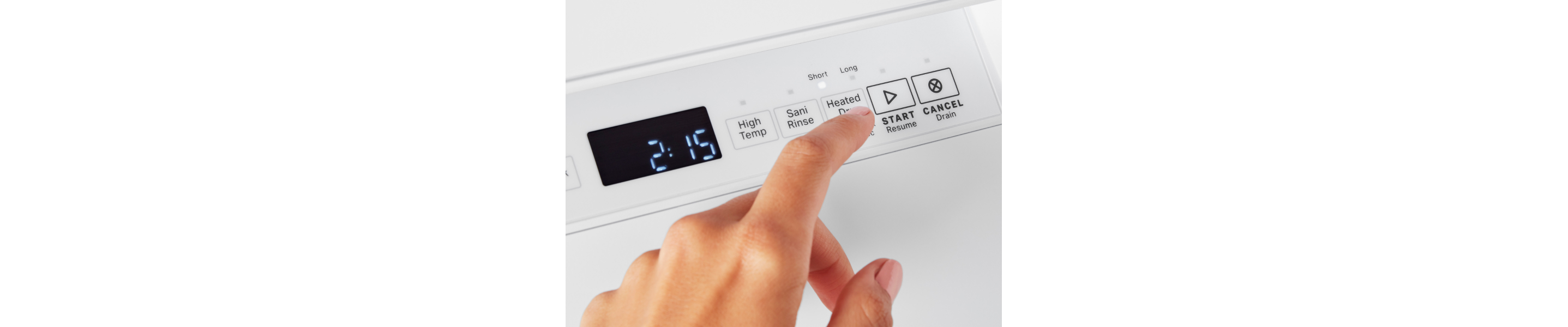 Person pushing start on white dishwasher.