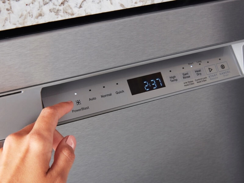 Person selecting PowerBlast on a dishwasher