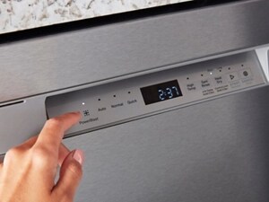 Person selecting PowerBlast on a dishwasher