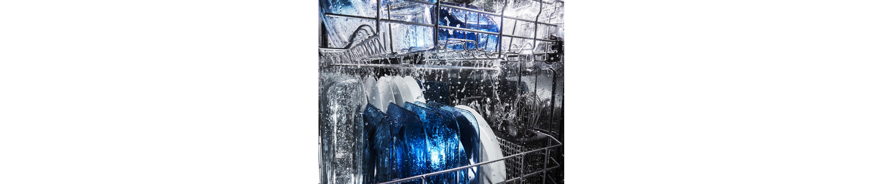 Water running over dishes in dishwasher
